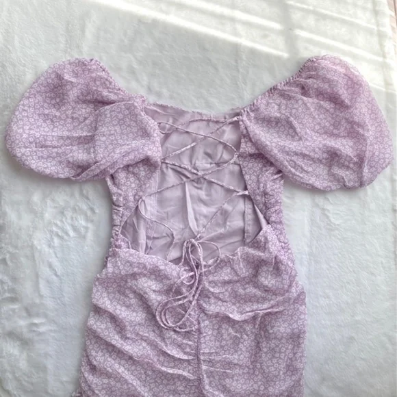 NWT Red Dress Boutique Purple Puff Sleeve Dress w/ Lace Up Open Back - Picture 10 of 16